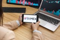 SAN FRANCISCO, US - 18 May 2019: Female Trader Hands Holding the Smartphone Using Application of BitMex Cryptocurrency Exchange Royalty Free Stock Photo