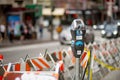 SAN FRANCISCO, USA - APRIL 2016: Parking meter in a busy street of downtown city of San Francisco Royalty Free Stock Photo