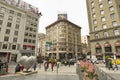 View of building facade and people walking around Union Square plaza in San Francisco, California,USA. Royalty Free Stock Photo