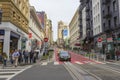 View of building facade and people walking around Union Square plaza in San Francisco, California,USA. Royalty Free Stock Photo