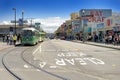 San Francisco, USA - April, 24, 2016: View of San Francisco street with tram or muni trolley traveling on the Embarcadero down