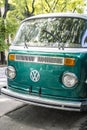 San Francisco, USA - January 15, 2023: Volkswagen vintage bus. Retro van hippie camper car on sunny street of the city.