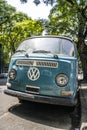 San Francisco, USA - January 15, 2023: Volkswagen vintage bus. Retro van hippie camper car on sunny street of the city.