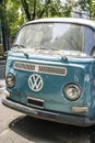 San Francisco, USA - January 15, 2023: Volkswagen vintage bus. Retro van hippie camper car on sunny street of the city.