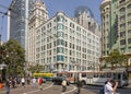 people downtown San Francisco with overhead bus and streetcar