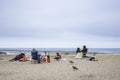 Families meat at the sandy beach and relax near San Francisco