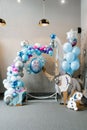 San Francisco, USA. May 2021. Festive balloons in blue and silver colors for your birthday. Frozen Heart style photo zone decor