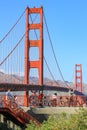 San Francisco, USA - October 8: People ride bicycle with a Golden Gate bridge in the background on October 8, 2011 in San Franci Royalty Free Stock Photo