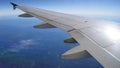 SAN FRANCISCO, USA - OCTOBER 4th, 2014: view from an airplane illuminator with earth and wing, aerial