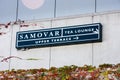 Address plaque pointing to Samovar Tea Lounge cafe