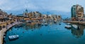 SAN GILJAN, MALTA - NOVEMBER 11, 2017: Boats on Spinola Bay in Mal Royalty Free Stock Photo