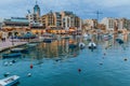 SAN GILJAN, MALTA - NOVEMBER 11, 2017: Boats on Spinola Bay in Mal Royalty Free Stock Photo