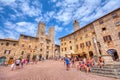 Panoramic view of famous Piazza della Cisterna in the historic town of San Gimignano on a sunny day, Tuscany, Italy Royalty Free Stock Photo