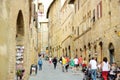 SAN GIMIGNANO, ITALY - JUNE 3, 2019: Famous medieval San Gimignano hill town with its skyline of medieval towers. Province of