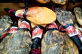 San Javier, Murcia, Spain - July 29 2018: A selection of whole legs of ham or Jamon in Spanish for sale in a supermarket