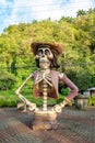 day opf dead figure in Costa rica with big mexican hat and colorful dress