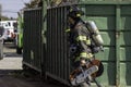 San Jose Fire Fighter on the seen during an Alviso scrap yard fire