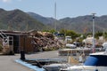 SAN JOSE, SPAIN - 23 MAY 2023 Small port with a berth for ships in a former fishing village called San Jose, Almeria, Spain