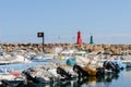 SAN JOSE, SPAIN - 23 MAY 2023 Small port with a berth for ships in a former fishing village called San Jose, Almeria, Spain