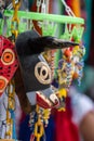 San Jose Succotz, Cayo, Belize - June 18, 2022: Multi-colored masks at Central American vendor stalls selling wares adjacent to