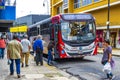 Colorful busses busy people traffic cityscape San JosÃÂ© Costa Rica