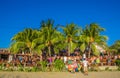 San Juan del Sur, Nicaragua - May 11, 2018: Crowd of people wearing underwear and fresh clothes at outdoor party in a