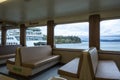 San Juan Island, WA USA - circa November 2021: Angled view of padded bench seating inside of a Washington State Ferry bound for Royalty Free Stock Photo