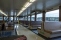 San Juan Island, WA USA - circa November 2021: Angled view of padded bench seating inside of a Washington State Ferry bound for Royalty Free Stock Photo