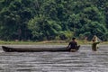 SAN JUAN, NICARAGUA - MAY 6, 2016: Fishermen with a small boat at San Juan river, Nicarag