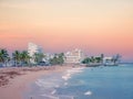 San Juan, Puerto Rico. January 2021. People is resting on San Juan`s Ocean Park Beach after a day`s work just before sunset