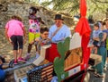 San Leo - Organ-grinder is teaching the children their craft
