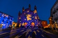 San Lorenzo cathedral illuminated for Christmas holidays in the evening in Alba, Italy.