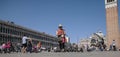 San Marco Square, Venice, Italy - flying pigeon. Royalty Free Stock Photo