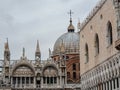 San Marco Basilica dome and facade with Palazzo Ducale in front. Royalty Free Stock Photo