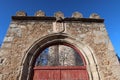 Coat of arms on the entrance door to the enclosure of the Coracera medieval castle built in 1434