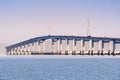 San Mateo Bridge connecting the Peninsula and East Bay in San Francisco Bay Area, California; Electricity towers and power lines