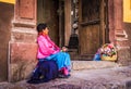 Mexican woman with traditional dress selling handcrafts Royalty Free Stock Photo