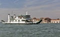 San Nicolo sea ferry sails in Venice lagoon, Italy.