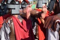 Foot of Jesus Christ`s corpse carried by roman soldiers, street drama, community celebrates Good Friday representing the events th