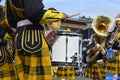 Male band member play drum on street exhibition during the annual brass band exhibition