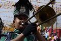 Male band member play trumphet on street during the annual brass band exhibition