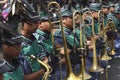 Male band member play trumphet on street during the annual brass band exhibition