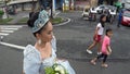 May flower pageantry young woman in ornate gown romp the street