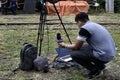 Field news reporter and vlogger working on their gears during the arrival of President Rodrigo R. Duterte to inaugurate the openin