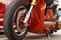 Close up of big motorcycle front wheel, focus tyre Royalty Free Stock Photo