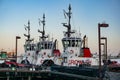 Three tugboats docked in the Port of Los Angeles harbor at San Pedro, California