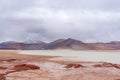 Frozen lagoon and snowy mountains in Atacama desert Royalty Free Stock Photo