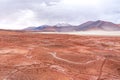 Desert, frozen lagoon and snowy mountains in Atacama Royalty Free Stock Photo