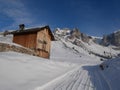 San Pellegrino Valley village in snowy italian Dolomites in sunny blue sky day Royalty Free Stock Photo