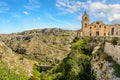 The San Pietro Caveoso church atop a canyon in ancient Matera Italy Royalty Free Stock Photo